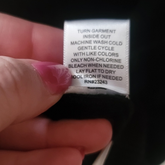 Black sweater with twisted back and lace sleeve detail. - Picture 7 of 7